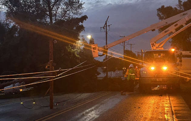 Crews work to restore power after a storm